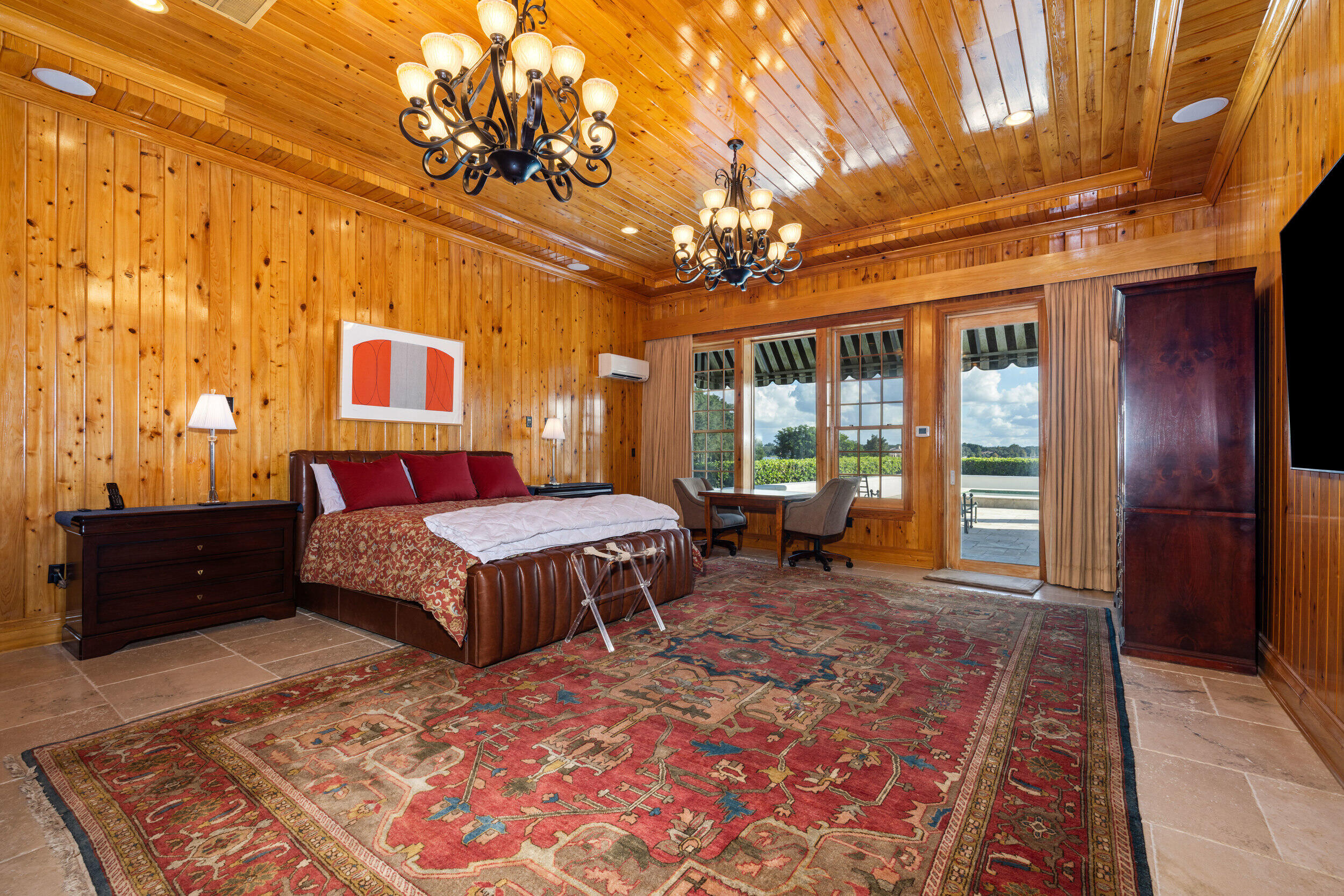 9508 Windy Ridge Road Windermere, FL 34786 - Photo 15 of 49 a bedroom with a bed dresser and a window