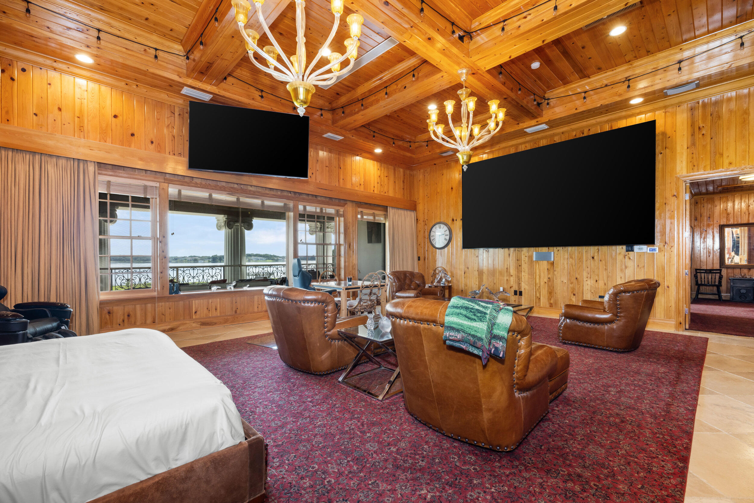 9508 Windy Ridge Road Windermere, FL 34786 - Photo 21 of 49 a outdoor living space with furniture and a flat screen tv