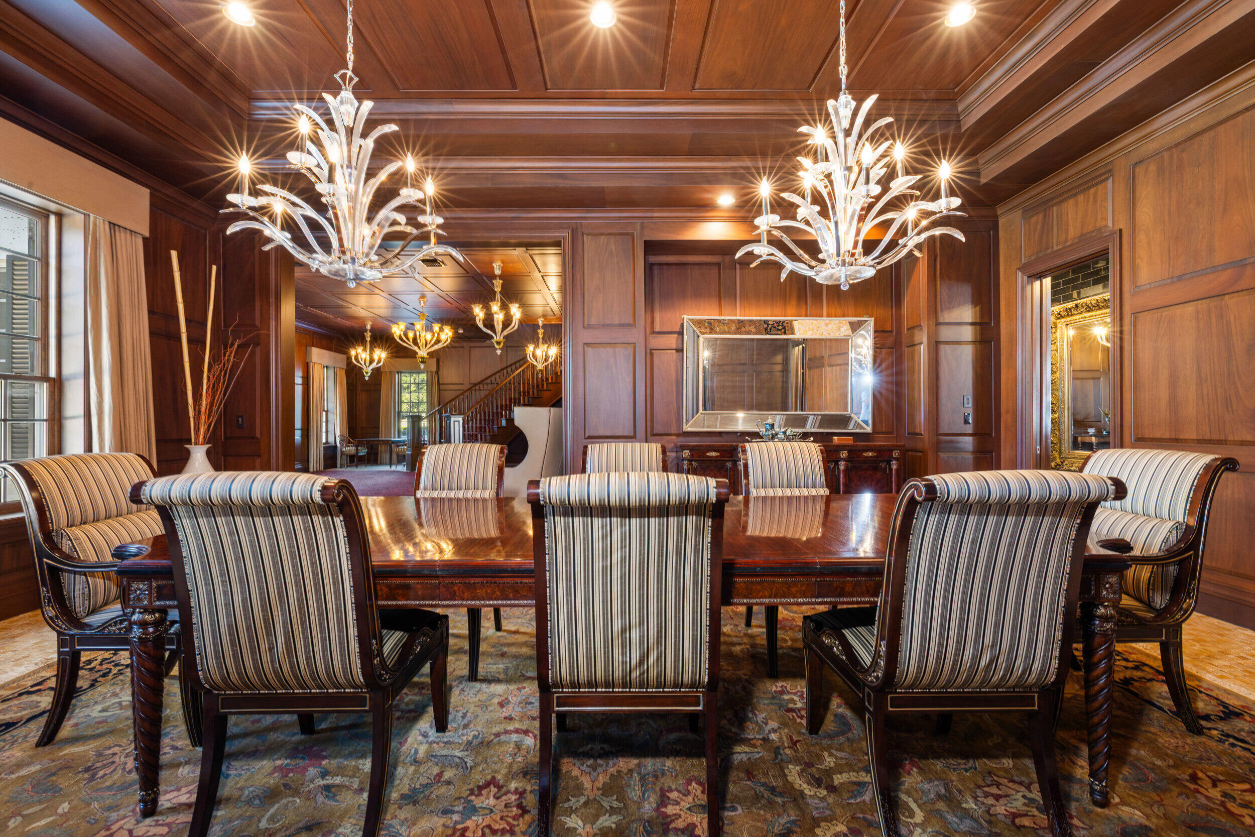 9508 Windy Ridge Road Windermere, FL 34786 - Photo 29 of 49 a view of a dining room with furniture and chandelier