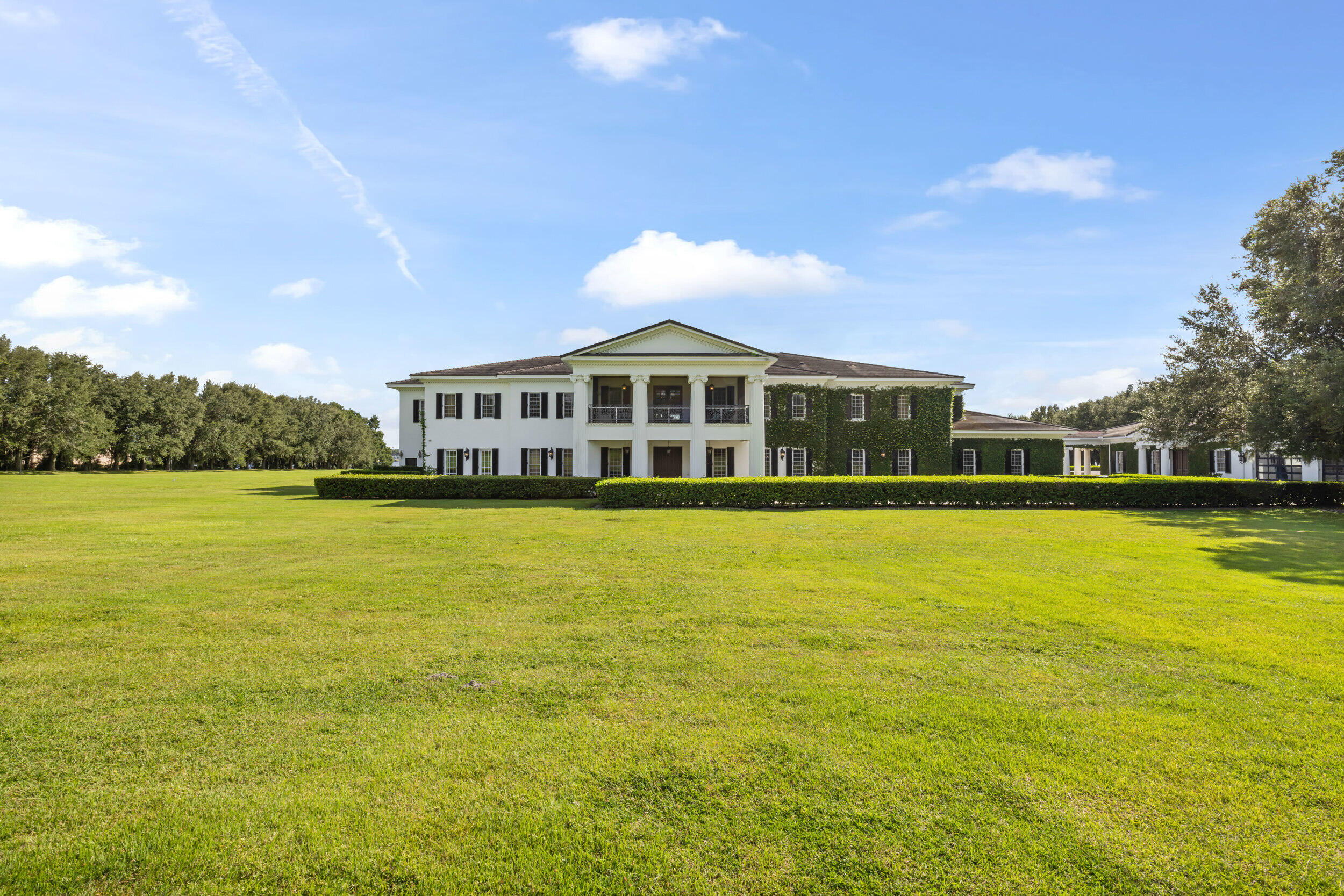 9508 Windy Ridge Road Windermere, FL 34786 - Photo 7 of 49 a view of a house with a ocean view