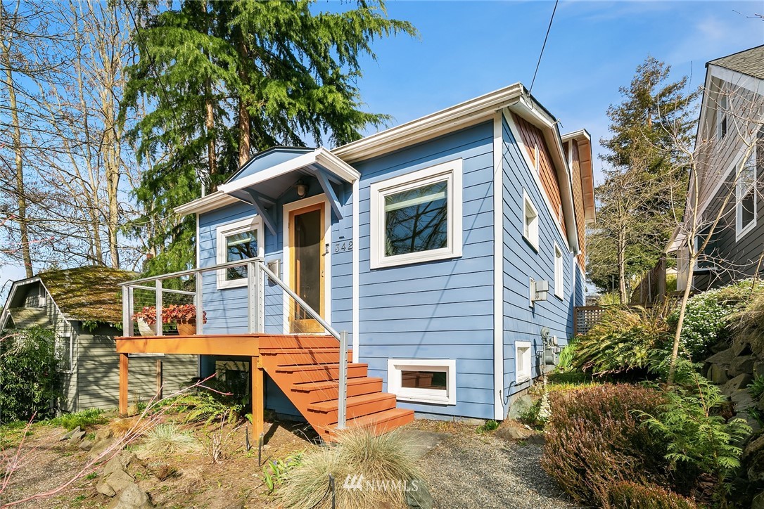 342 Northwest 48th Street Seattle, WA 98107 - Photo 1 of 20 a backyard of a house with table and chairs