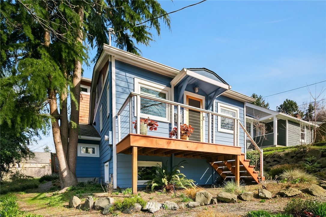 342 Northwest 48th Street Seattle, WA 98107 - Photo 2 of 20 a front view of a house with a yard