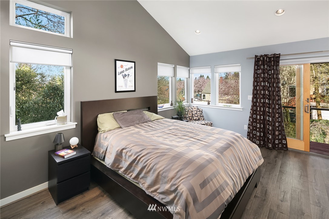 342 Northwest 48th Street Seattle, WA 98107 - Photo 12 of 20 a bedroom with a bed and a large window