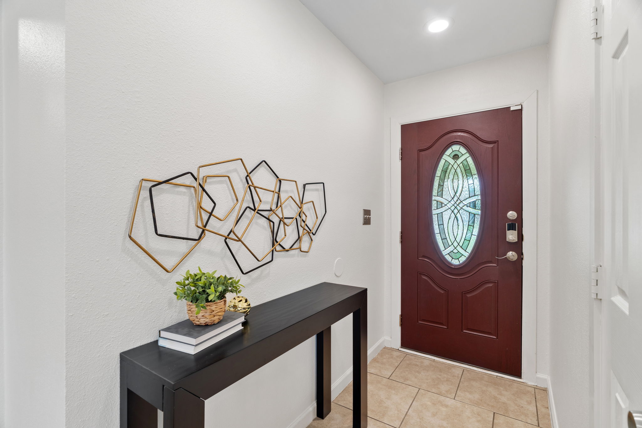 2604 Cockburn Drive Austin, TX 78745 - Photo 11 of 34 A welcoming foyer sets the tone with clean finishes and bright walls.