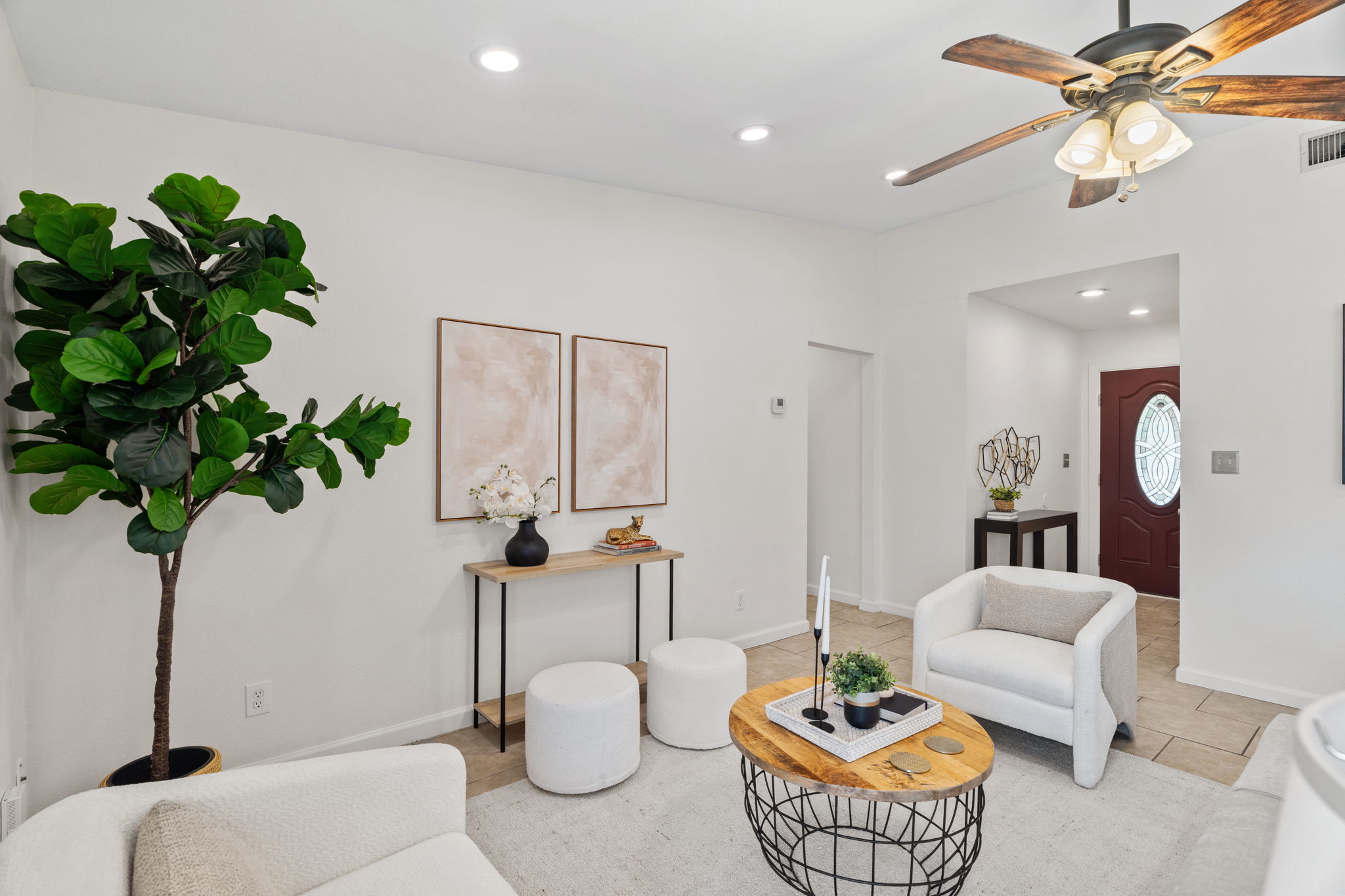 2604 Cockburn Drive Austin, TX 78745 - Photo 12 of 34 A living room filled with natural light and ready for everything from quiet mornings to lively evenings.