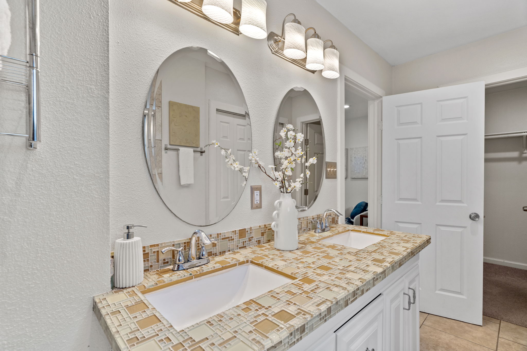 2604 Cockburn Drive Austin, TX 78745 - Photo 23 of 34 A bright and comfortable primary bathroom designed for everyday living.