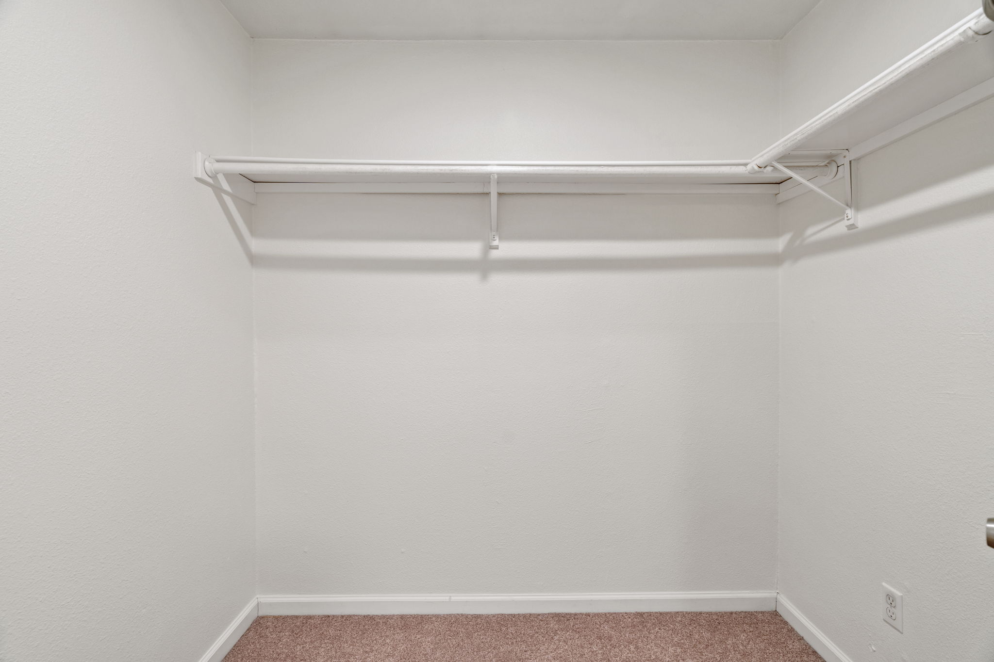 2604 Cockburn Drive Austin, TX 78745 - Photo 24 of 34 Plenty of room in this walk in closet for boots, jackets, and every outfit Austin life throws your way.