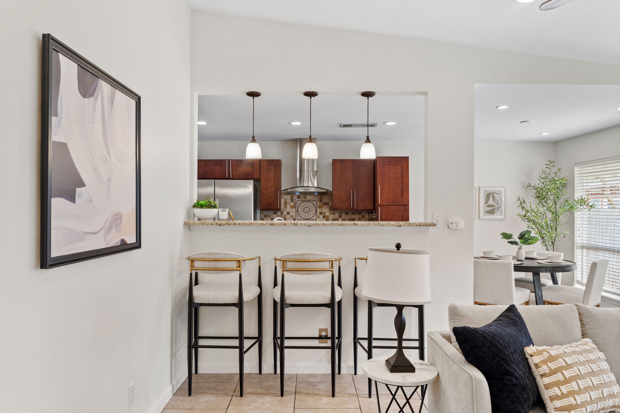 2604 Cockburn Drive Austin, TX 78745 - Photo 27 of 34 A breakfast bar perfect for morning coffee, quick bites, or catching up at the end of the day.