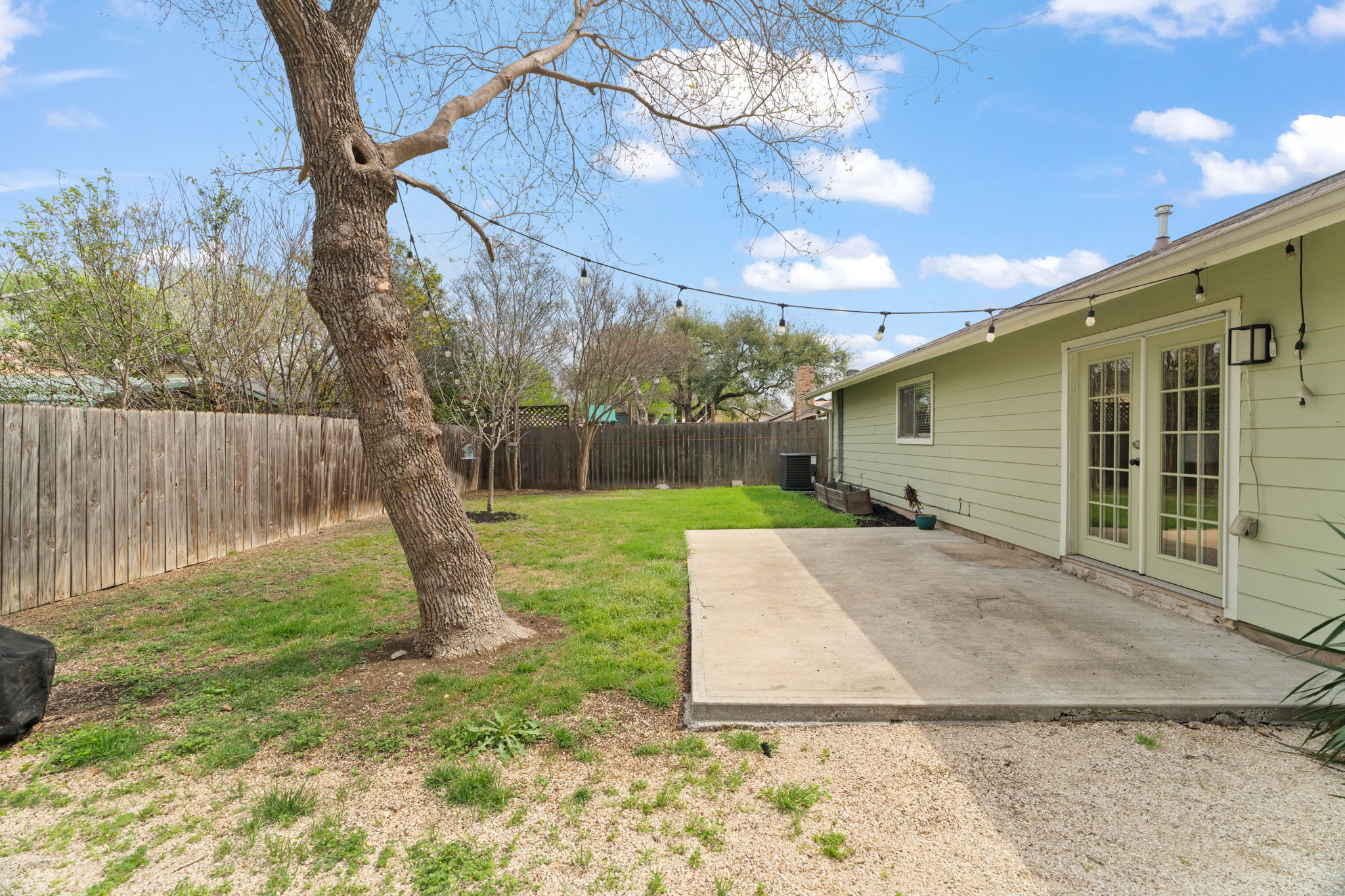 2604 Cockburn Drive Austin, TX 78745 - Photo 32 of 34 The backyard patio is ready for barbecues, happy hour, or a quiet night outside with friends.