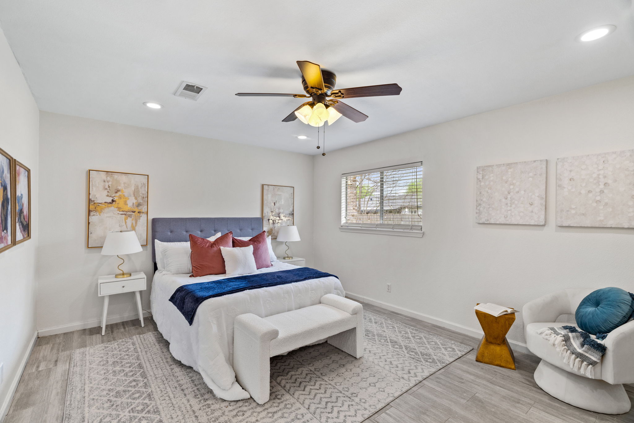2604 Cockburn Drive Austin, TX 78745 - Photo 4 of 34 This oversized primary bedroom easily accommodates larger furniture while still feeling open and uncluttered.