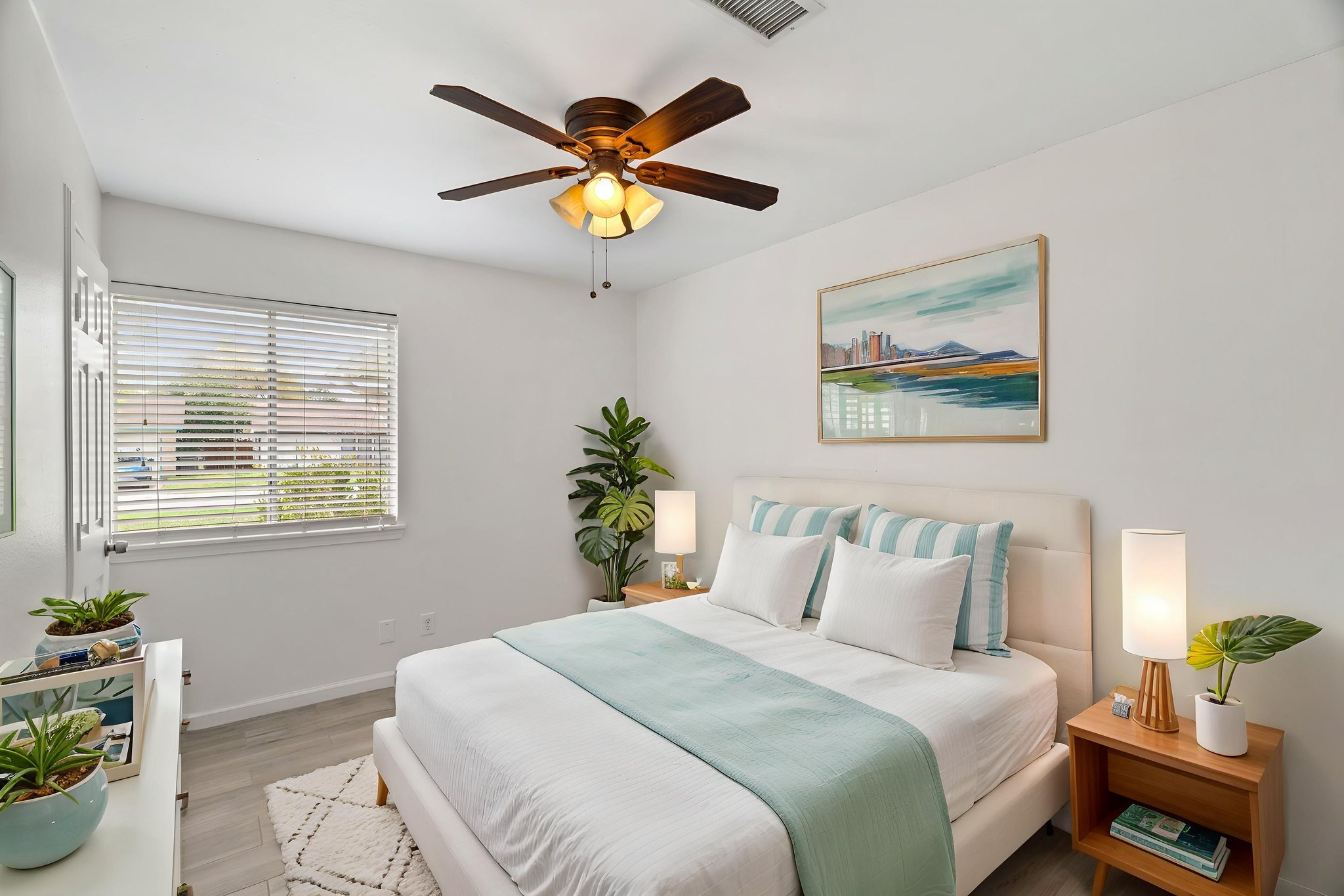 2604 Cockburn Drive Austin, TX 78745 - Photo 7 of 34 A bright bedroom retreat designed for rest and quiet mornings.