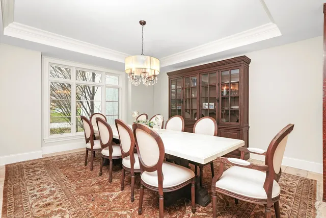 a living room with furniture wooden floor and a table