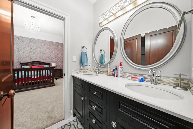 a bed room with furniture and a flat screen tv