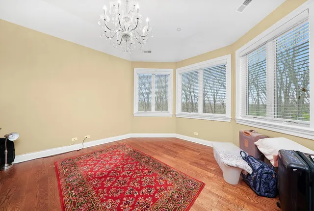 a bathroom with a toilet a sink and a mirror