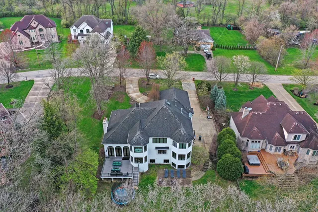 an aerial view of a house with a garden