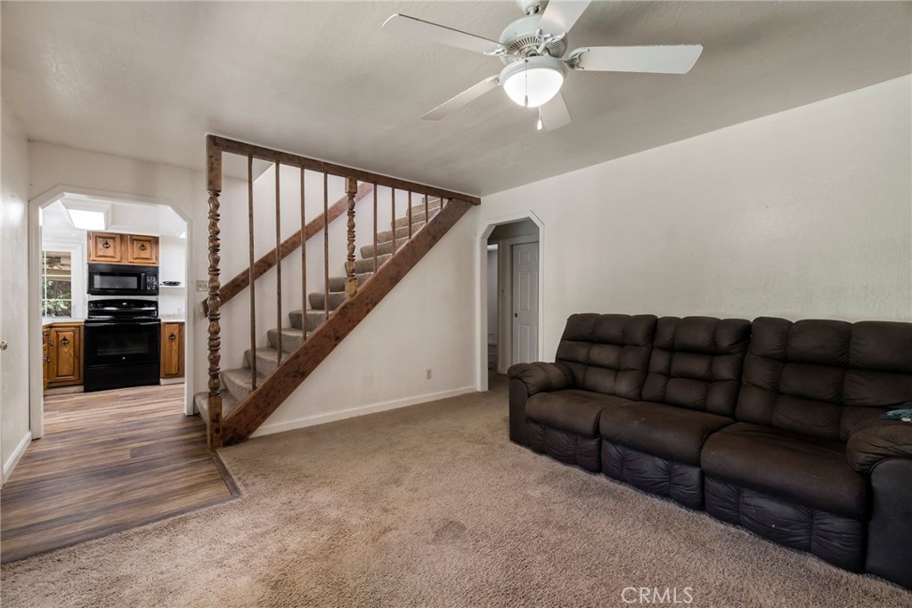 5048 Big Bend Road Oroville, CA 95965 - Photo 12 of 72 a living room with furniture and wooden floor