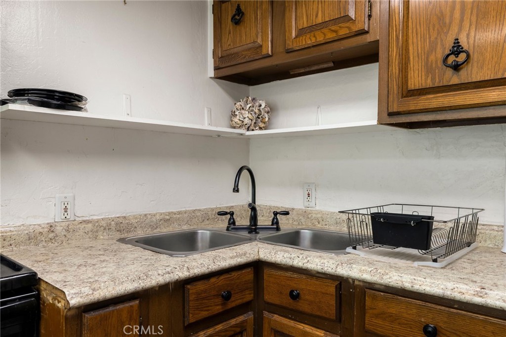 5048 Big Bend Road Oroville, CA 95965 - Photo 17 of 72 a kitchen with a sink and cabinets