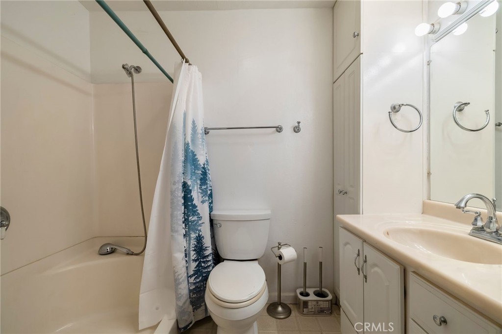 5048 Big Bend Road Oroville, CA 95965 - Photo 26 of 75 a bathroom with a granite countertop sink toilet and shower