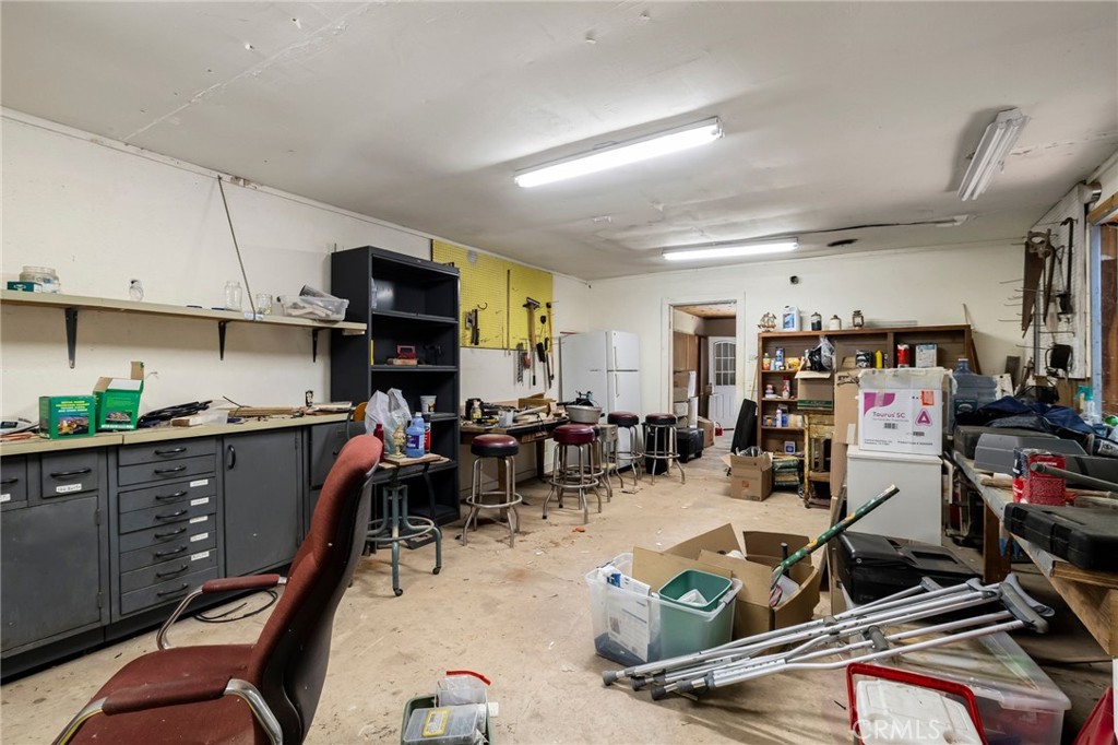 5048 Big Bend Road Oroville, CA 95965 - Photo 42 of 72 a room with gym equipment and a view of living room