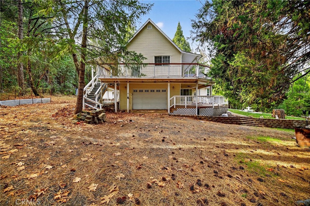 5048 Big Bend Road Oroville, CA 95965 - Photo 60 of 75 a view of house with backyard and trees