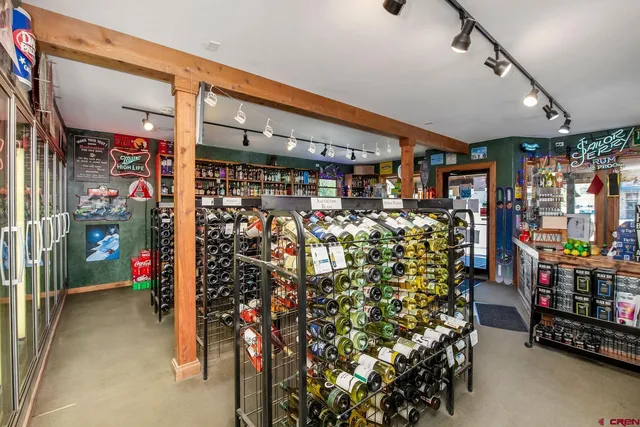 a view of path along with retail shop and buildings