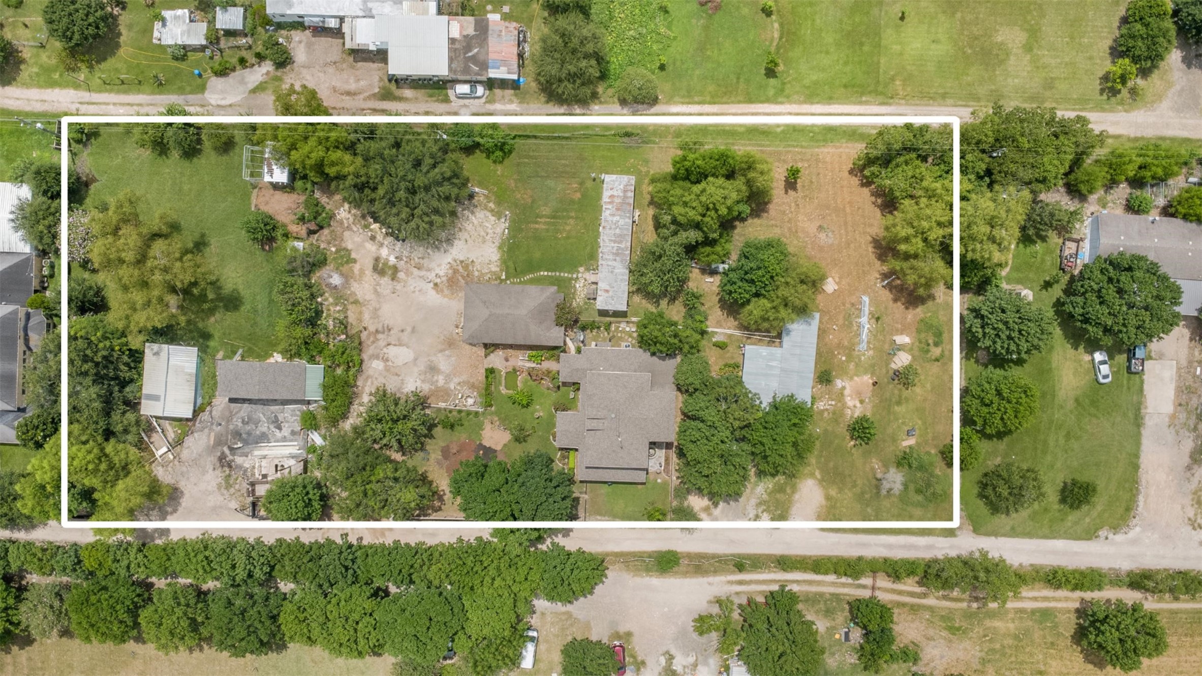 2622 Muegge Road Rosenberg, TX 77471 - Photo 13 of 28 an aerial view of residential houses with outdoor space and swimming pool