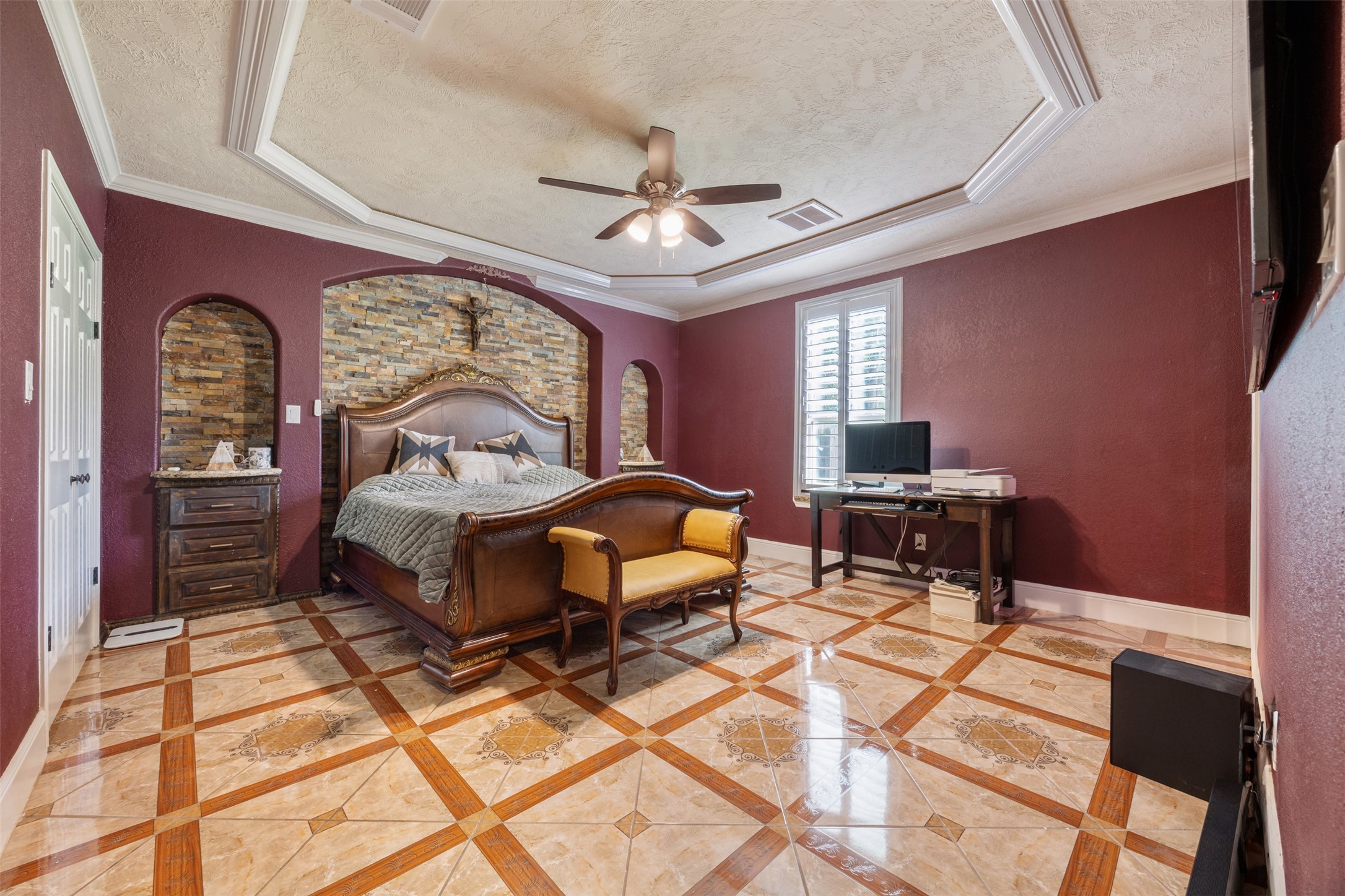 2622 Muegge Road Rosenberg, TX 77471 - Photo 21 of 28 a bedroom with a bed and wooden floor