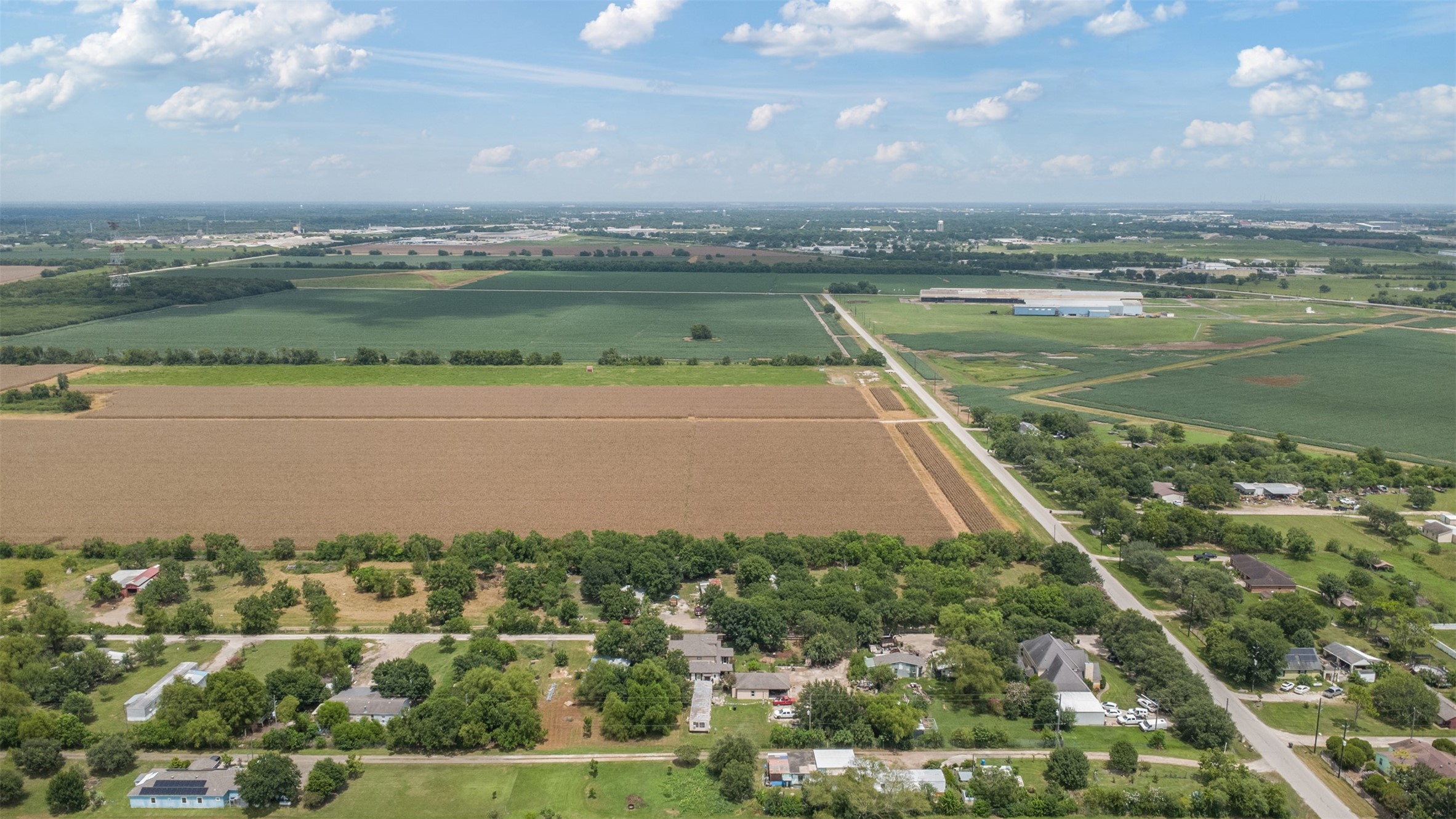 2622 Muegge Road Rosenberg, TX 77471 - Photo 28 of 28 an aerial view of a house with a lake view