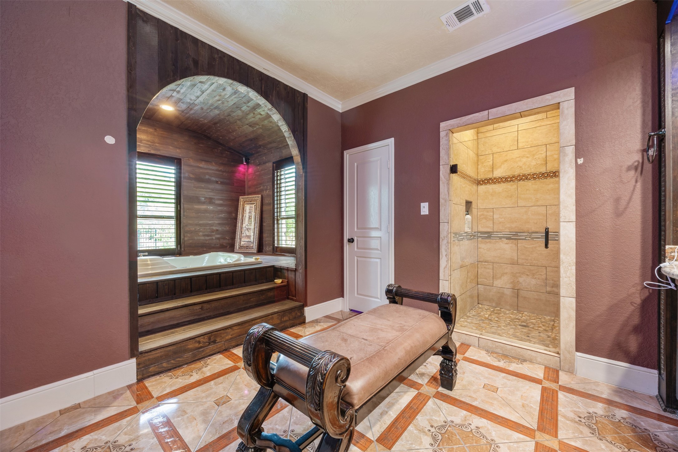 2622 Muegge Road Rosenberg, TX 77471 - Photo 7 of 28 a bedroom with a bed and a chandelier