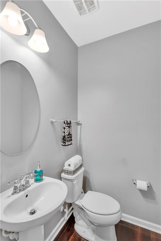 1304 Pointe View Drive Mars, PA 16046 - Photo 15 of 29 a white toilet sitting next to a bathroom sink