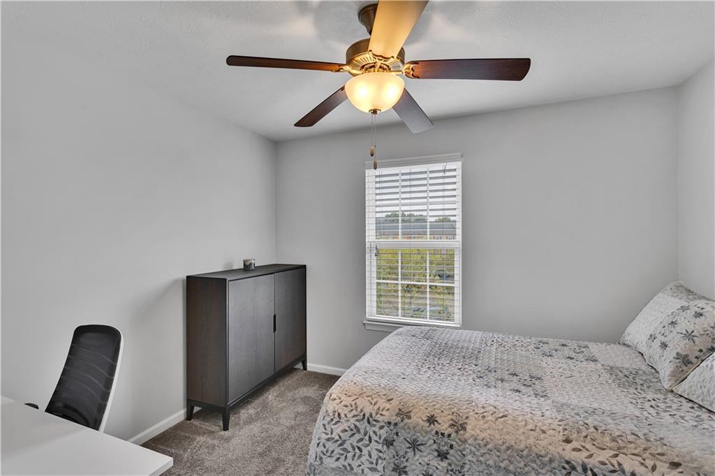 1304 Pointe View Drive Mars, PA 16046 - Photo 20 of 29 a bedroom with a bed and a large window