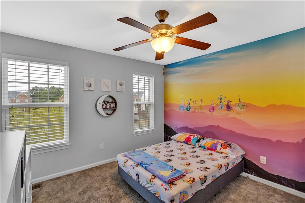 1304 Pointe View Drive Mars, PA 16046 - Photo 22 of 29 a bedroom with a bed and a chandelier