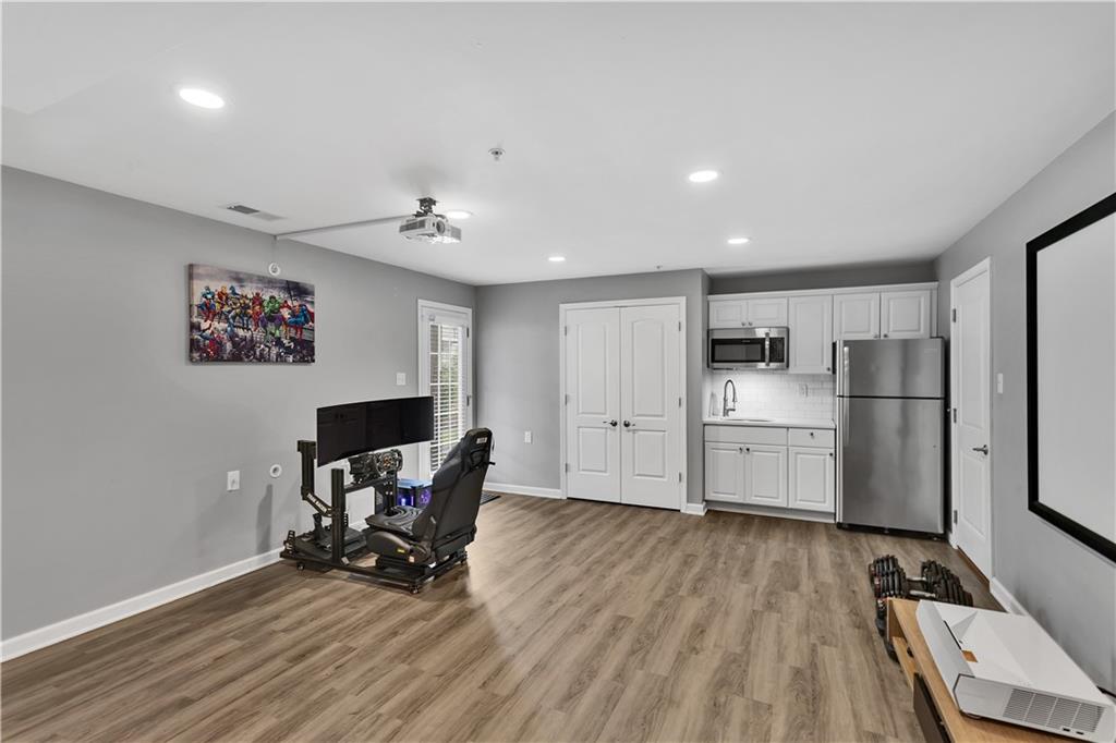 1304 Pointe View Drive Mars, PA 16046 - Photo 23 of 29 a view of a kitchen with refrigerator and wooden floor