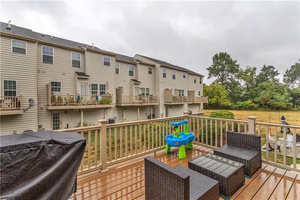 a view of a chairs on the deck