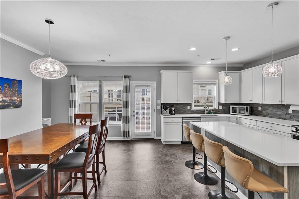 1304 Pointe View Drive Mars, PA 16046 - Photo 4 of 29 a large kitchen with a table and chairs