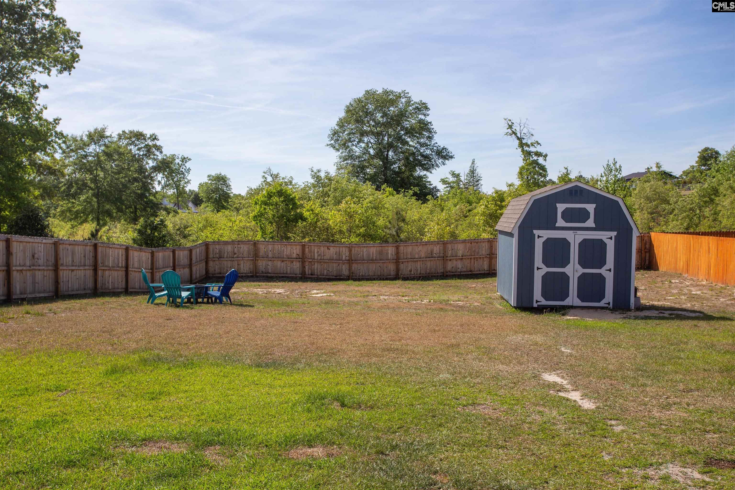 272 Shadowbrook Way Camden, SC 29020 - Photo 38 of 43 a view of a backyard with entertaining space