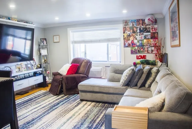 a living room with furniture and a couch