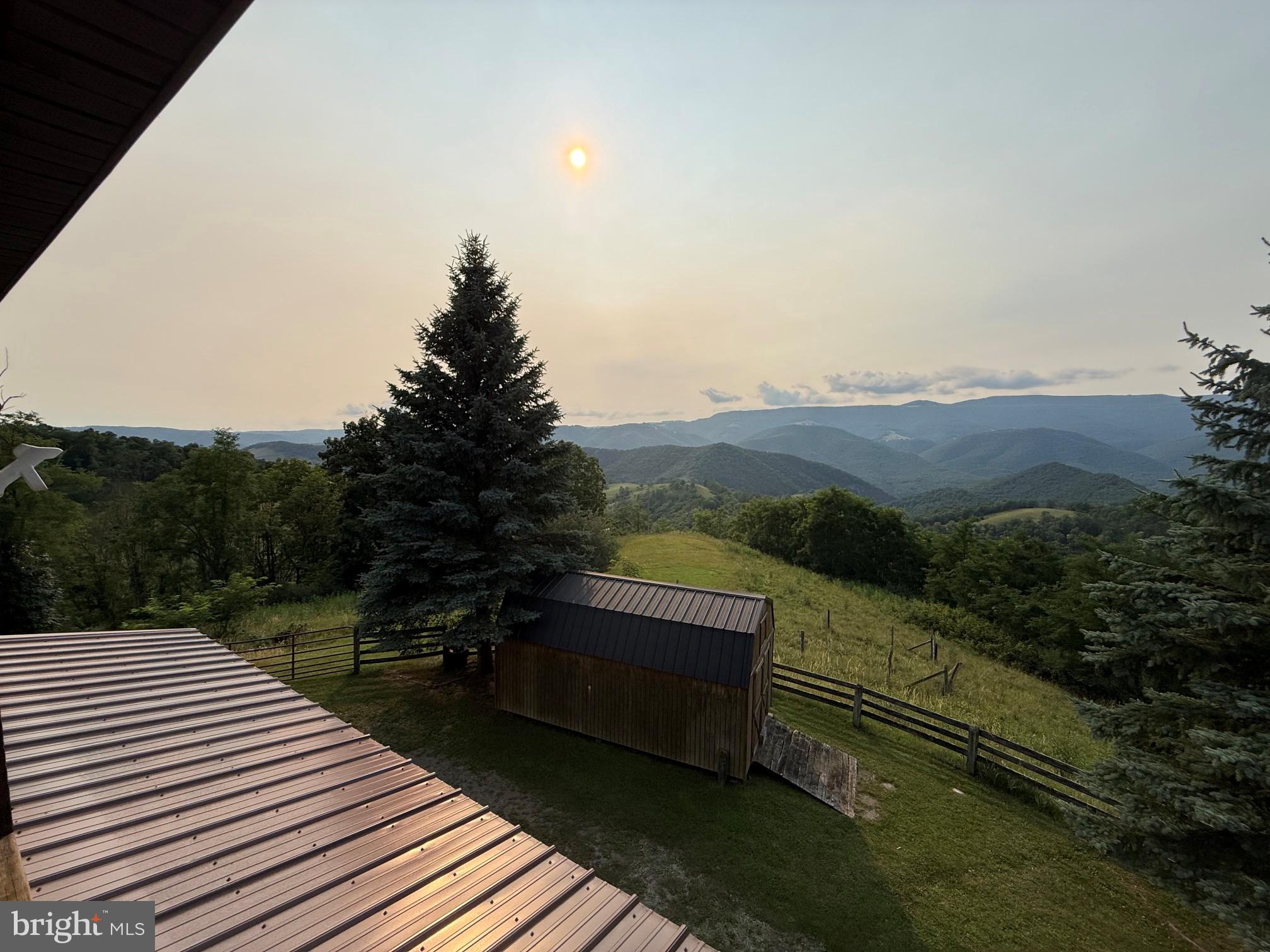 1492 Dice Warner Road Circleville, WV 26804 - Photo 34 of 36 Serene mountain vista at sunset.