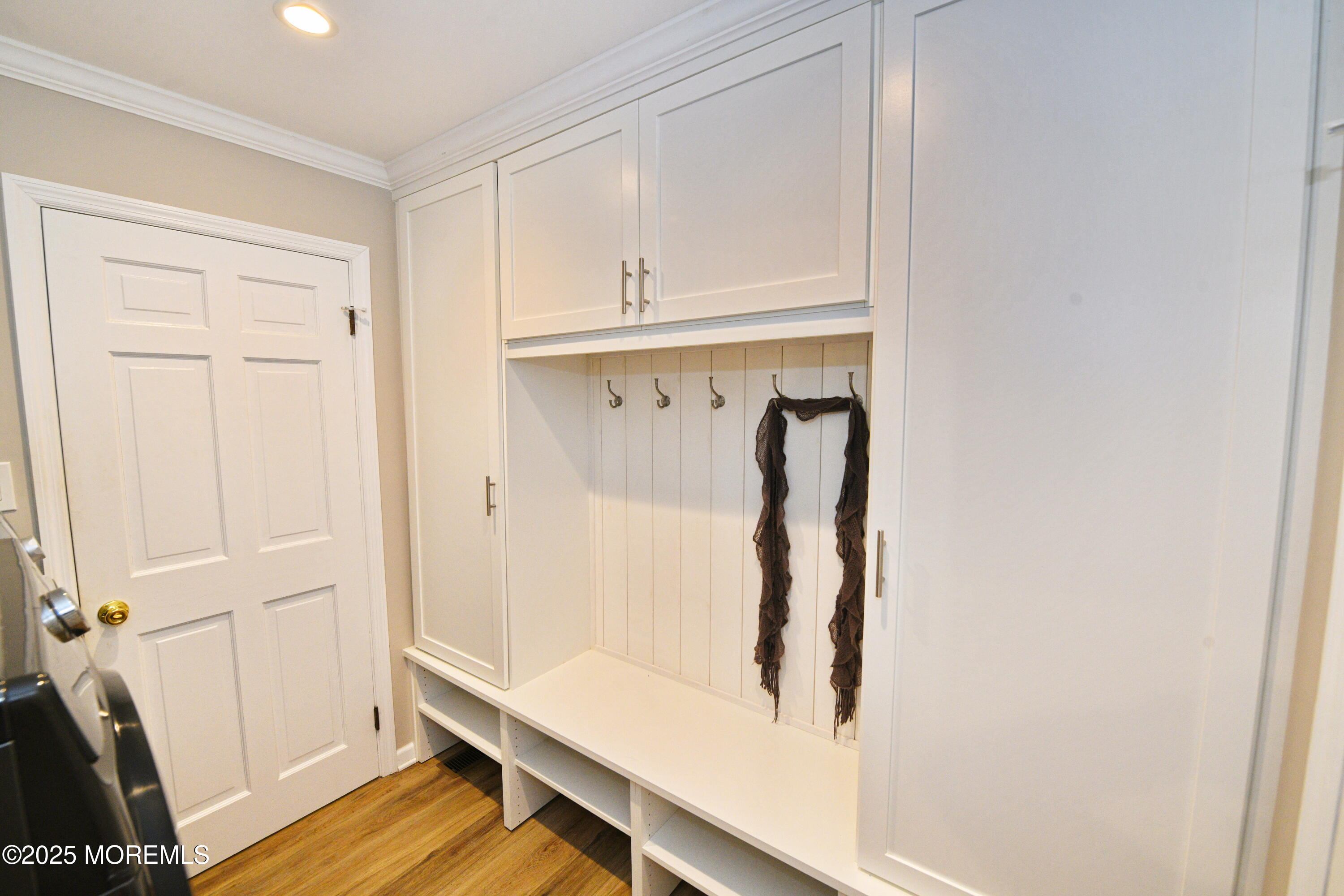 1608 Osprey Court Point Pleasant, NJ 08742 - Photo 14 of 40 a view of walk in closet with wooden floor
