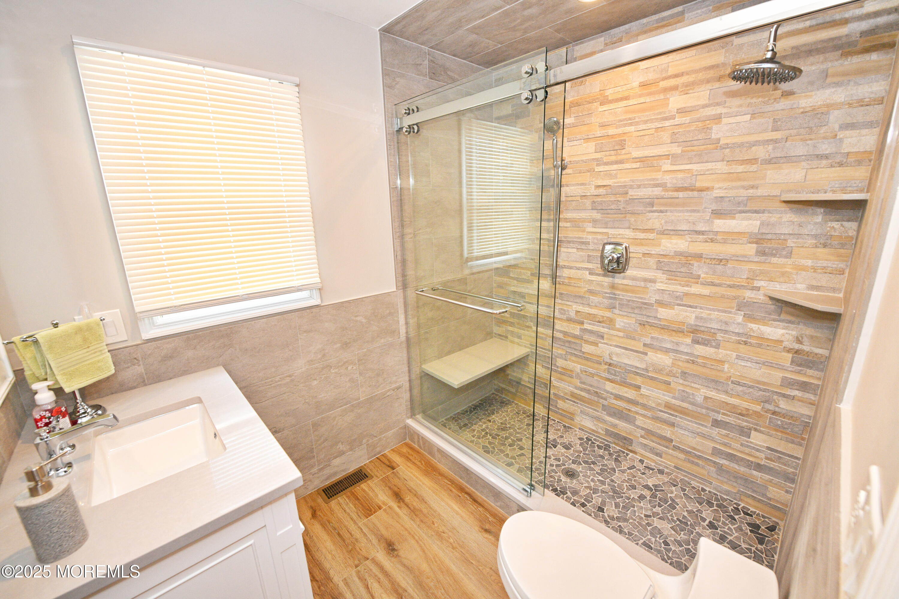 1608 Osprey Court Point Pleasant, NJ 08742 - Photo 16 of 40 a bathroom with a sink toilet and shower