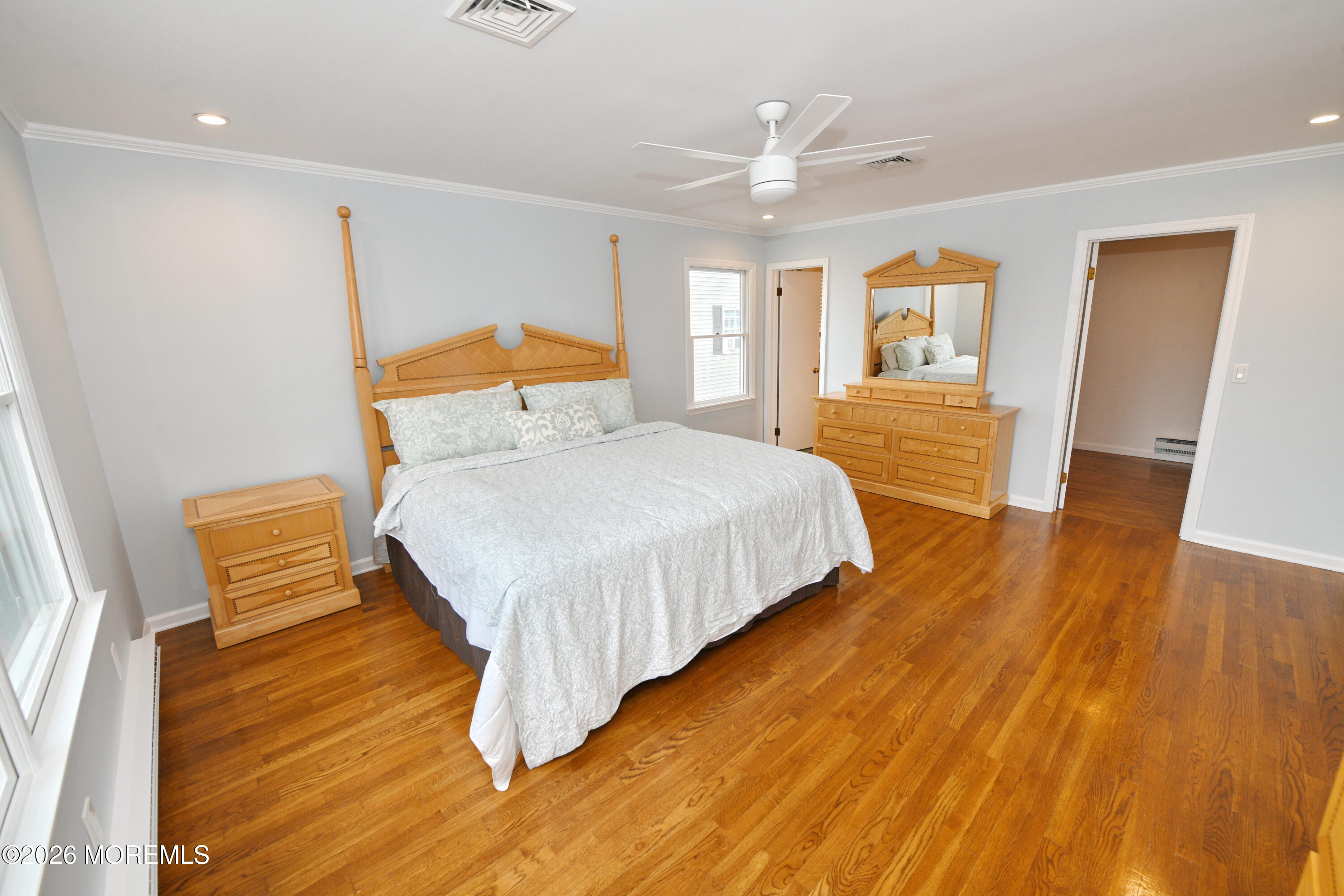 1608 Osprey Court Point Pleasant, NJ 08742 - Photo 18 of 40 a bedroom with a bed and wooden floor