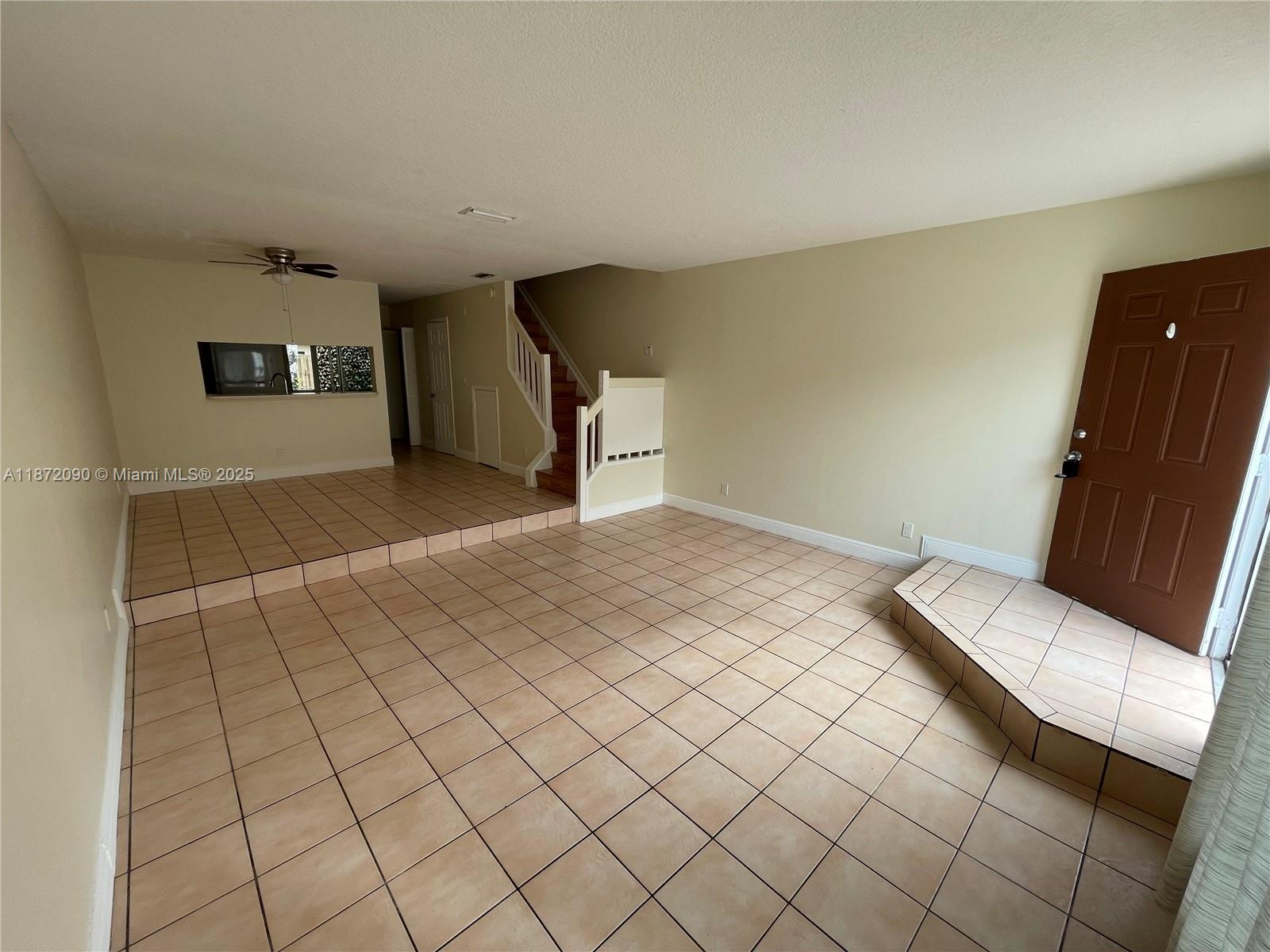 2880 Belmont Lane, Unit 2880 Cooper City, FL 33026 - Photo 6 of 16 a view of an empty room with windows