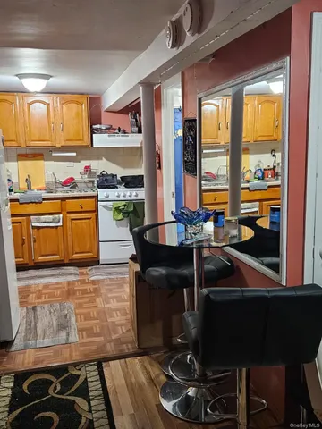 a kitchen with stainless steel appliances granite countertop a stove and a sink
