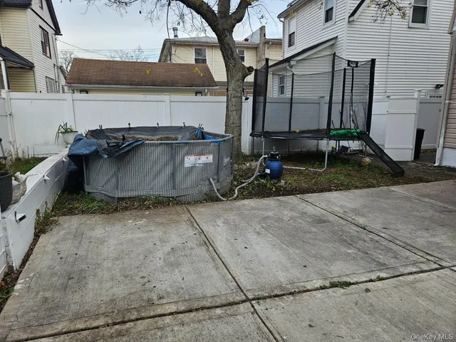 a view of a back yard of the house