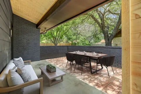 a view of a outdoor seating area with furniture