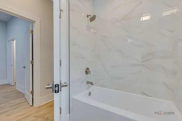 a bathroom with a bathtub