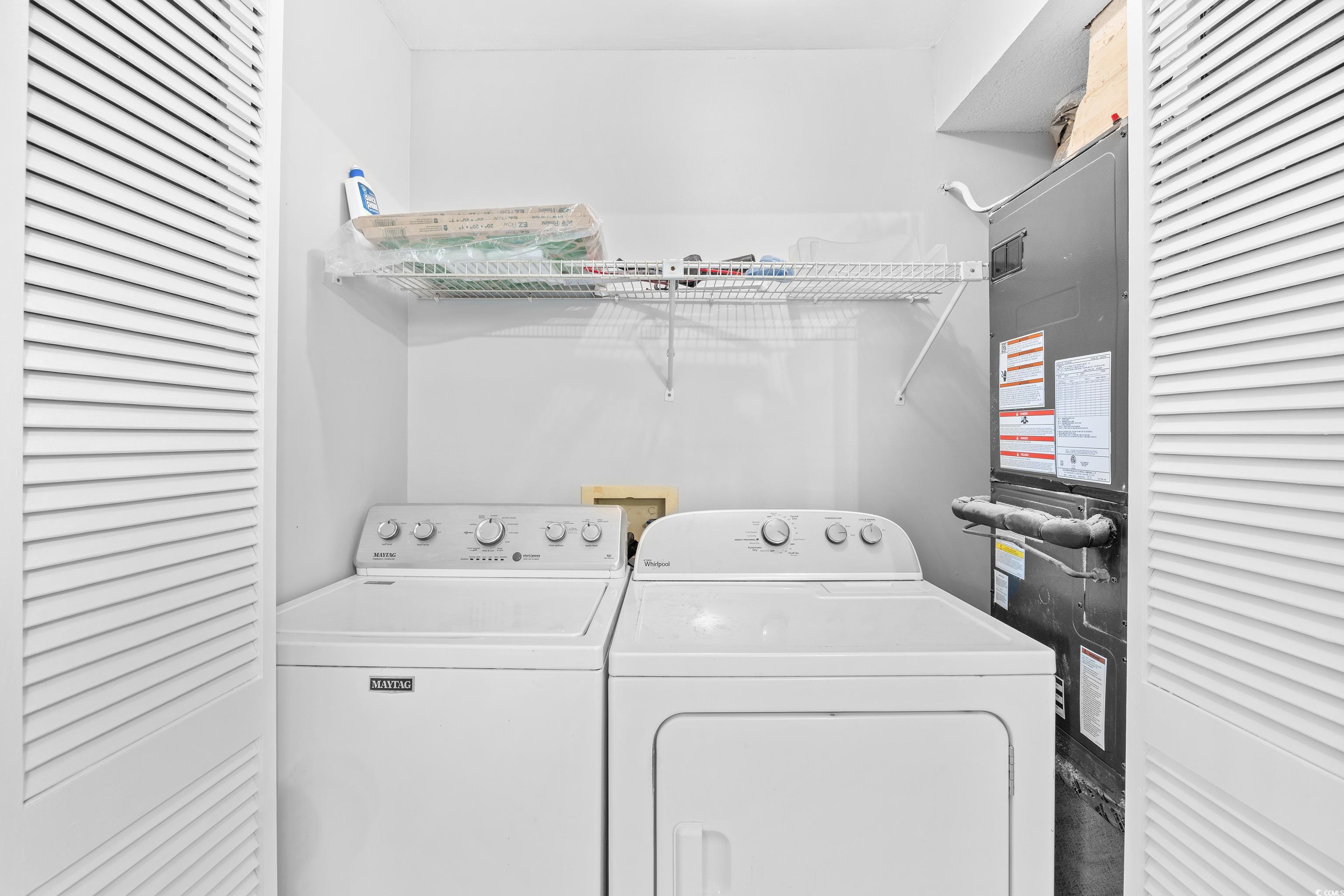 617 Surfside Drive Surfside Beach, SC 29575 - Photo 14 of 39 Laundry room with washing machine and clothes dryer and heating unit