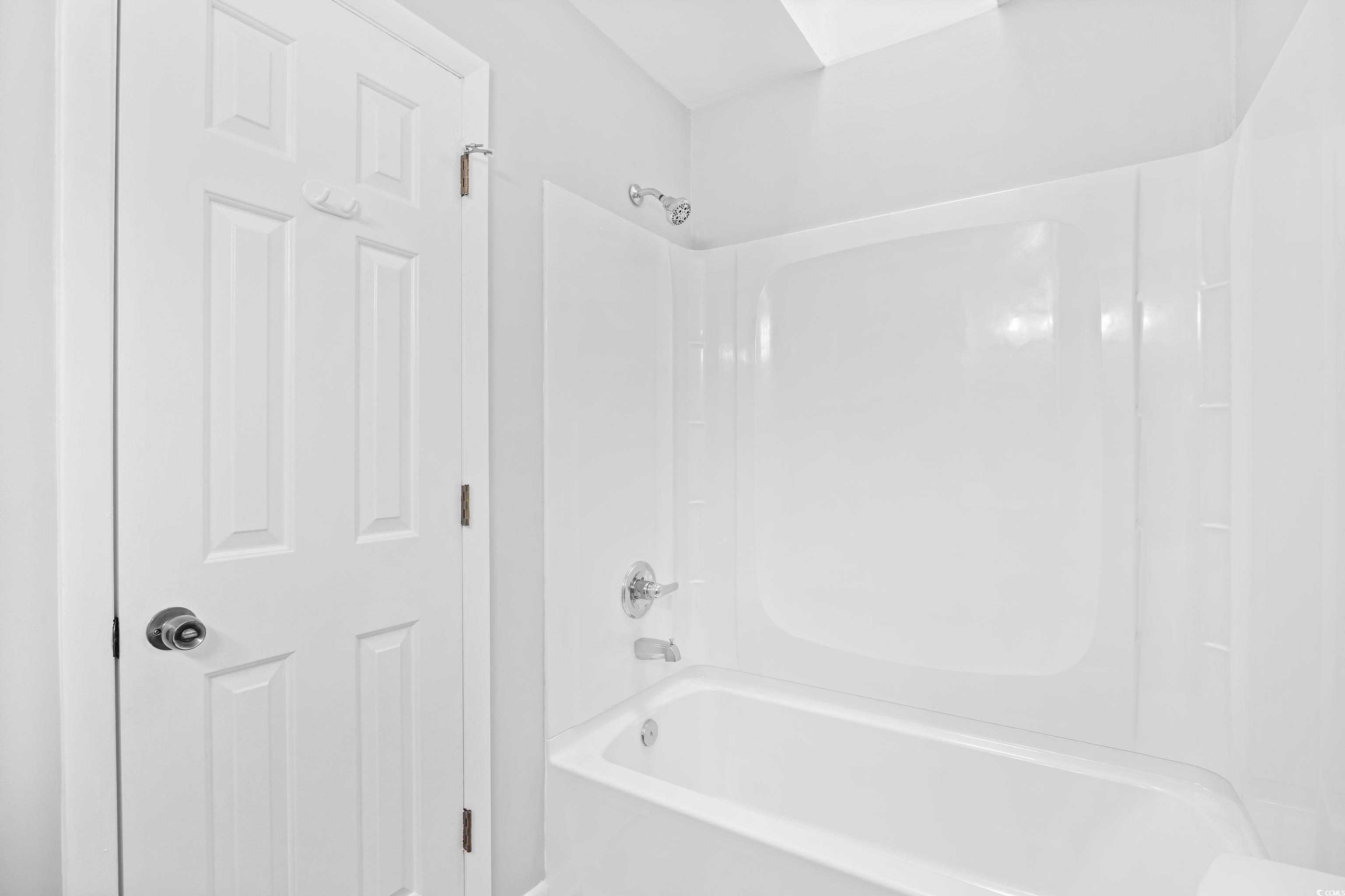 617 Surfside Drive Surfside Beach, SC 29575 - Photo 21 of 39 Bathroom featuring shower combination