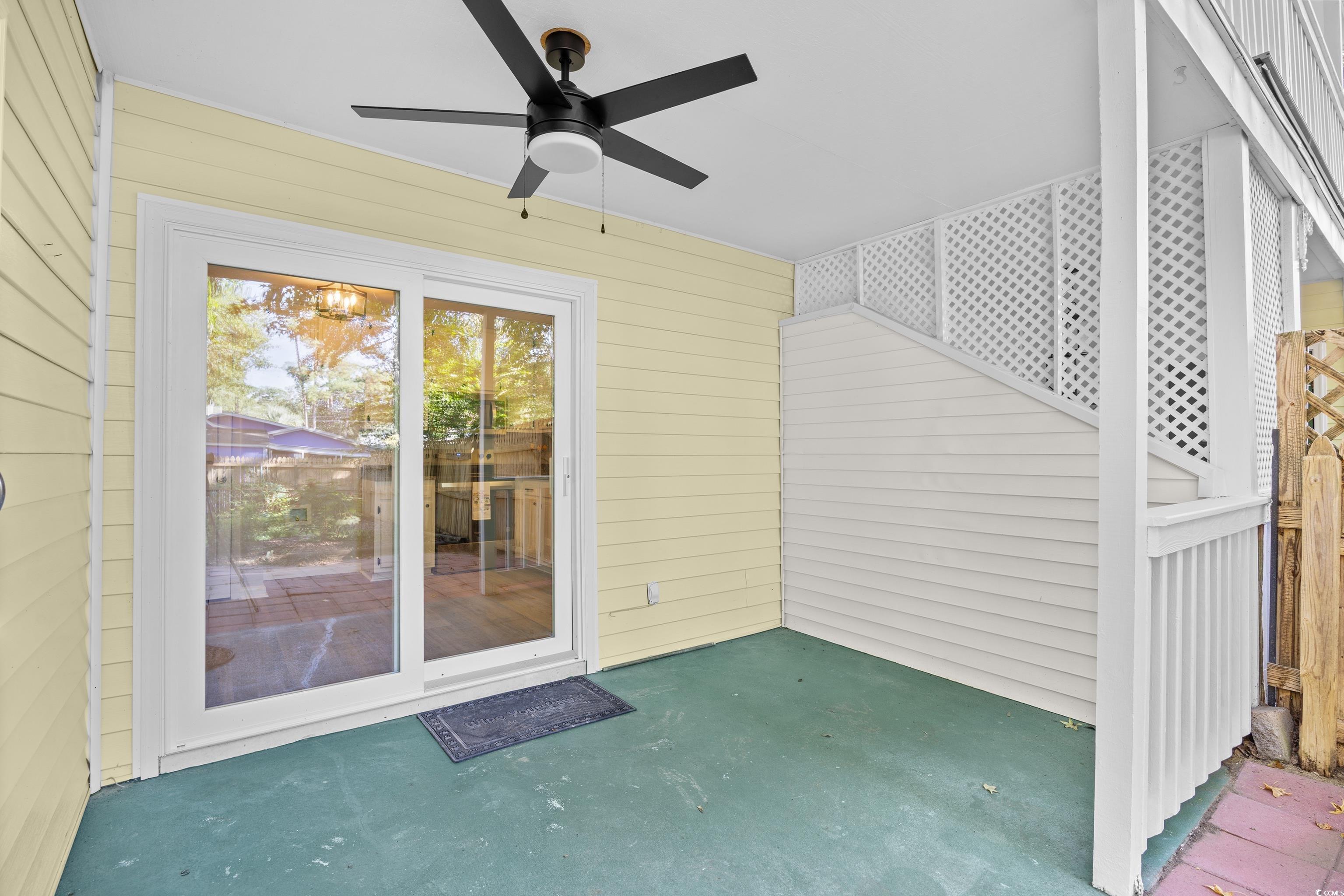 617 Surfside Drive Surfside Beach, SC 29575 - Photo 31 of 39 Entrance to property featuring a patio and ceiling fan