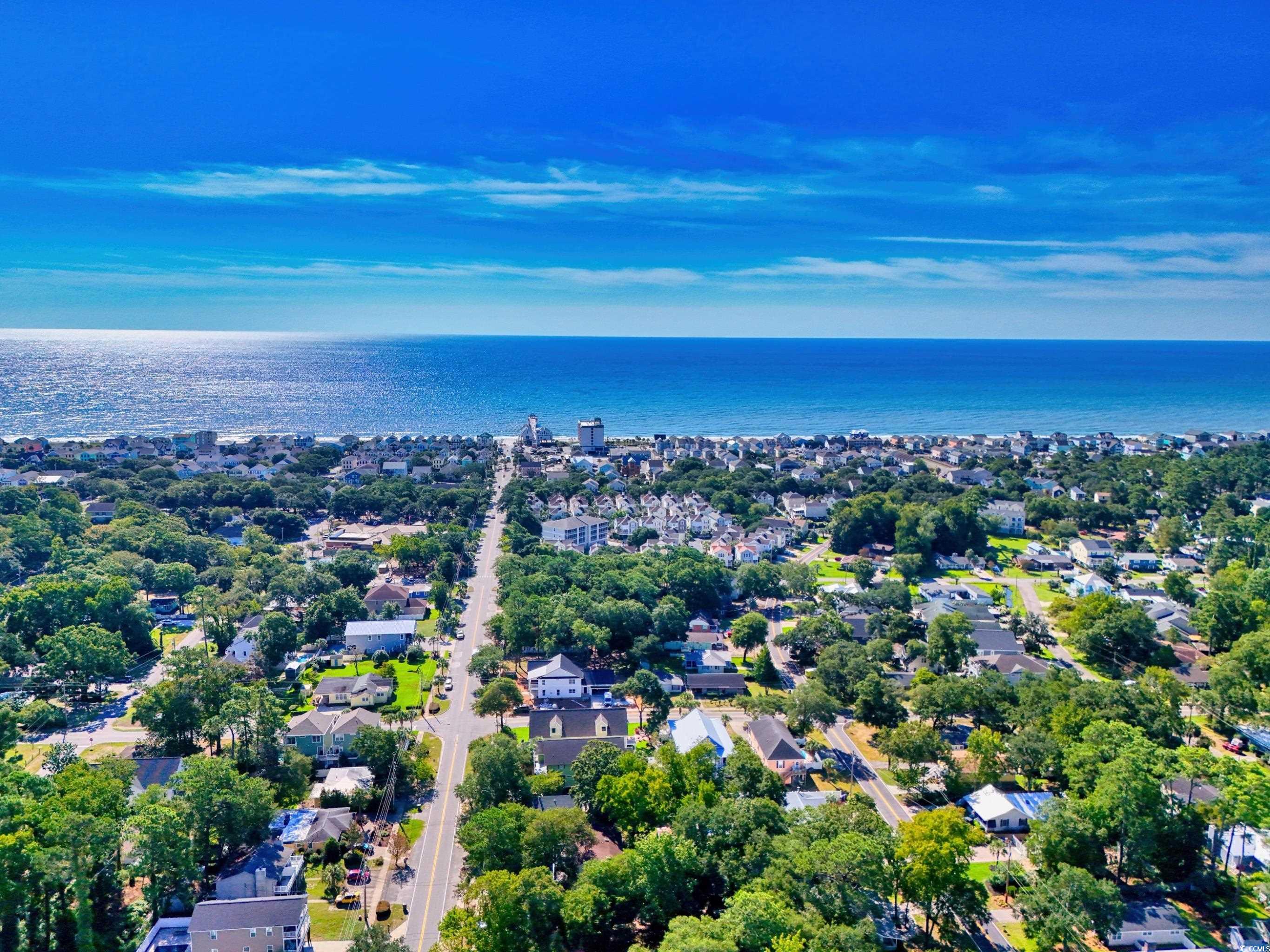 617 Surfside Drive Surfside Beach, SC 29575 - Photo 32 of 39 View of urban area with a nearby body of water and a tree filled landscape